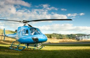 New Zealand-KinlochClubTaupoNZ-Helicopter-at-ClubhouseJULY15FINAL_LR4000x2666 Luxury Golf Vacation
